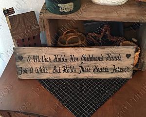 A Mother Holds Her Children's Hands For A While, But Holds Their Hearts Forever 24"x5.5"