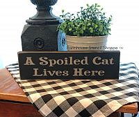 A Spoiled Cat Lives Here - 12"x3.5"
